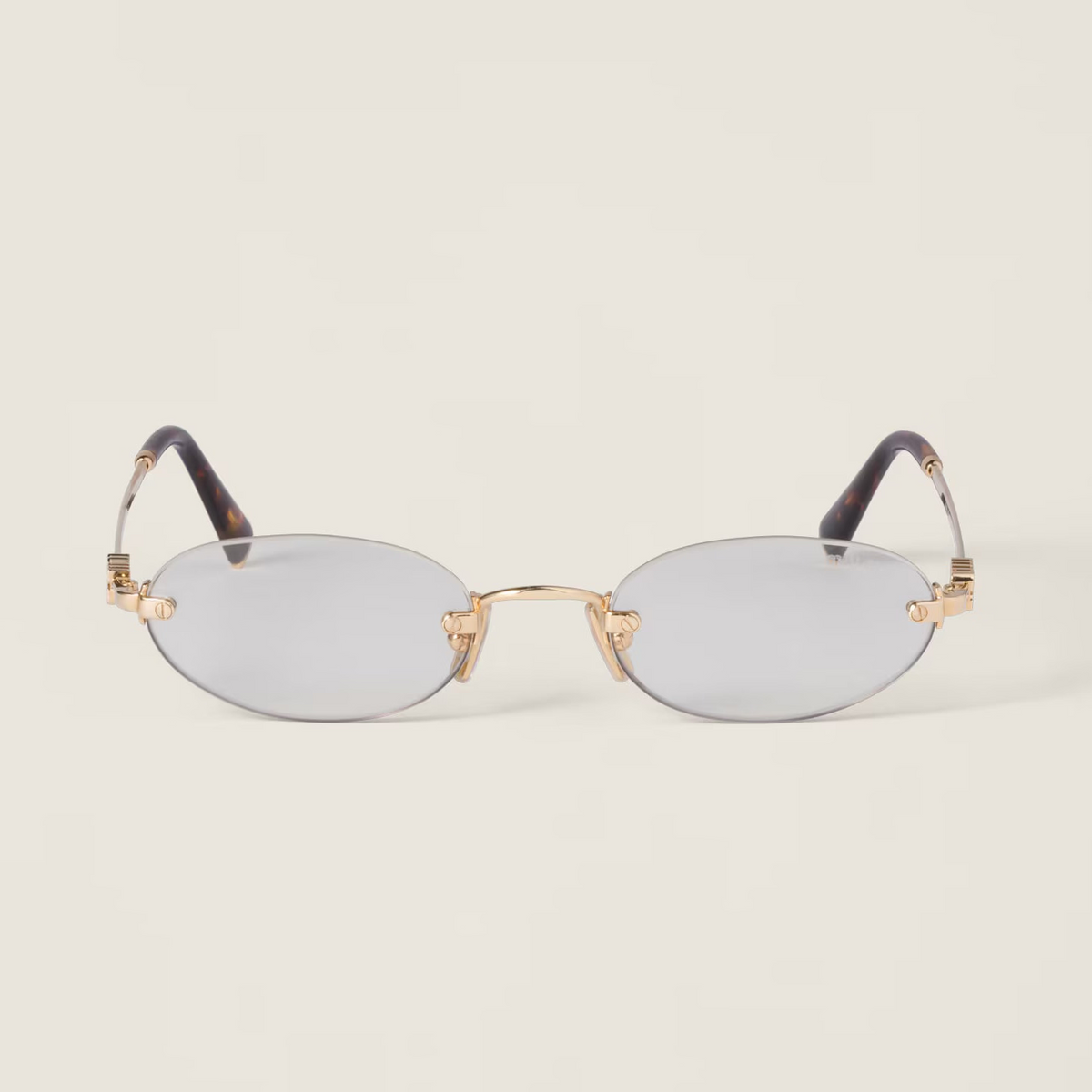 Miu Miu Women's MU A54S Rimless Oval – Gold / Clear Blue-ray Transparent Glasses